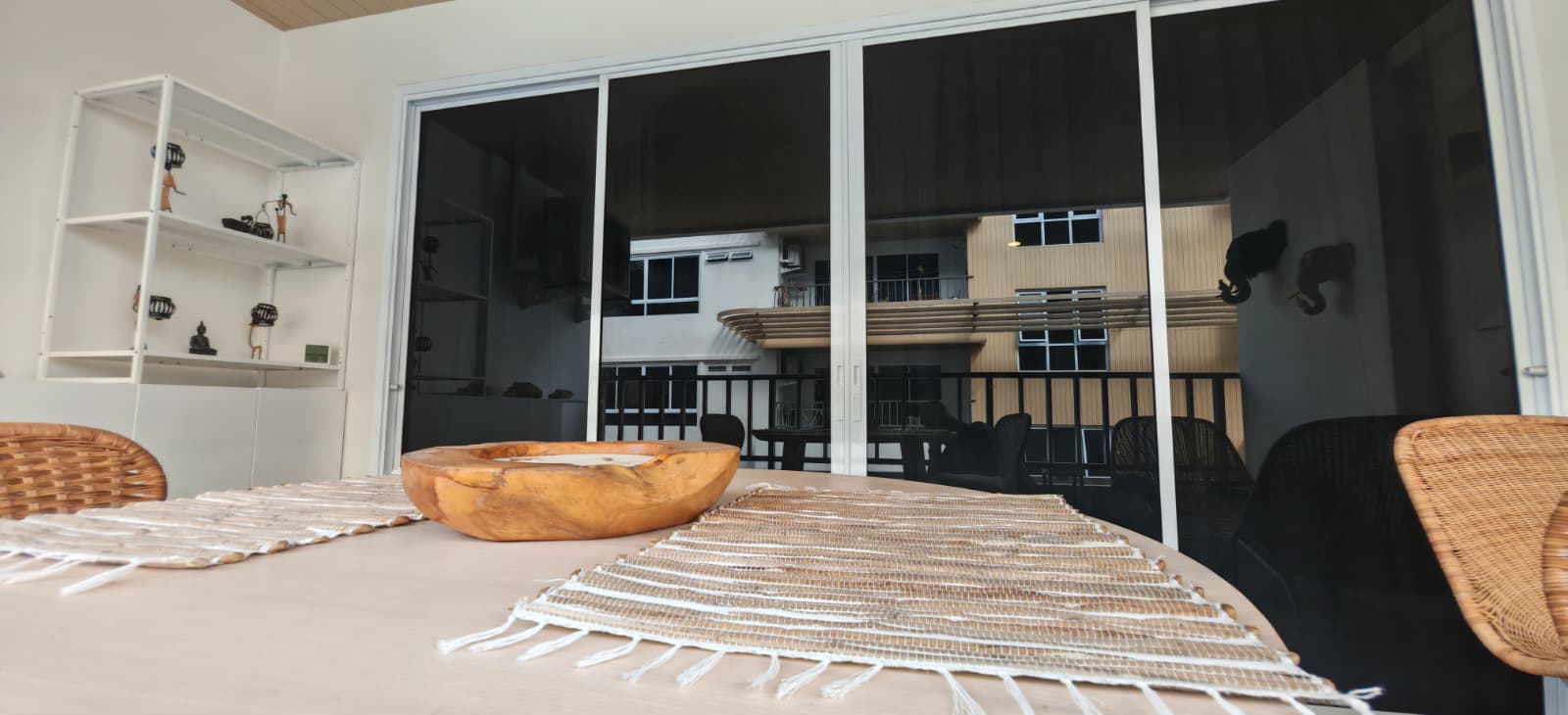 Sliding glass doors to balcony with shelving, Terraza Lamai