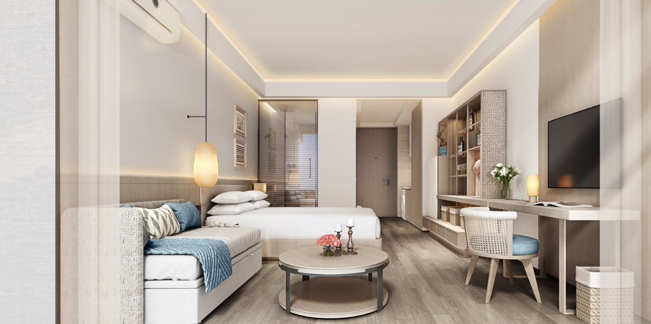 Studio condo interior with sofa bed and work desk at Anava Samui