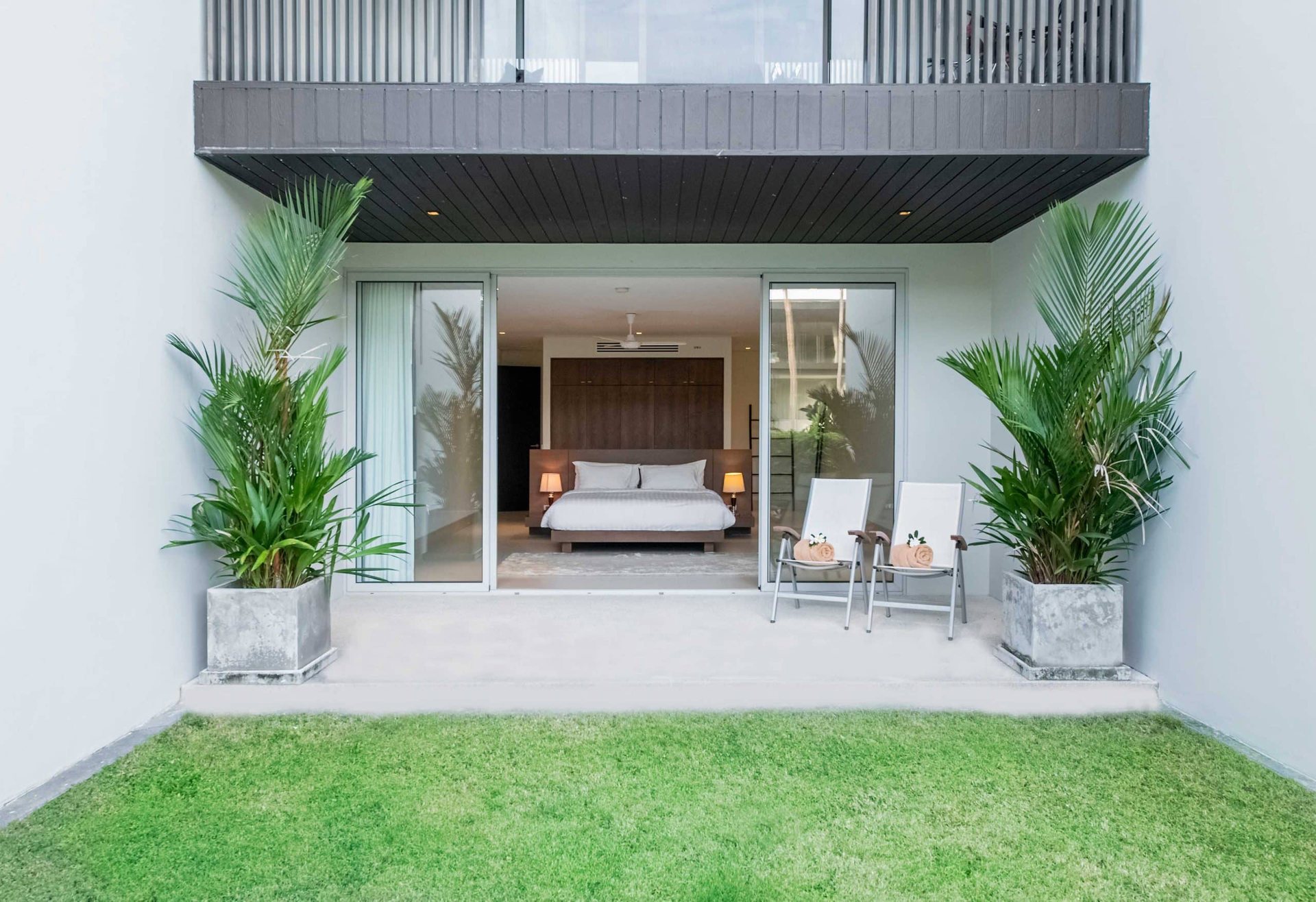 Baan Yamu Residences, Cape Yamu, Phuket – Duplex bedroom opening onto garden terrace