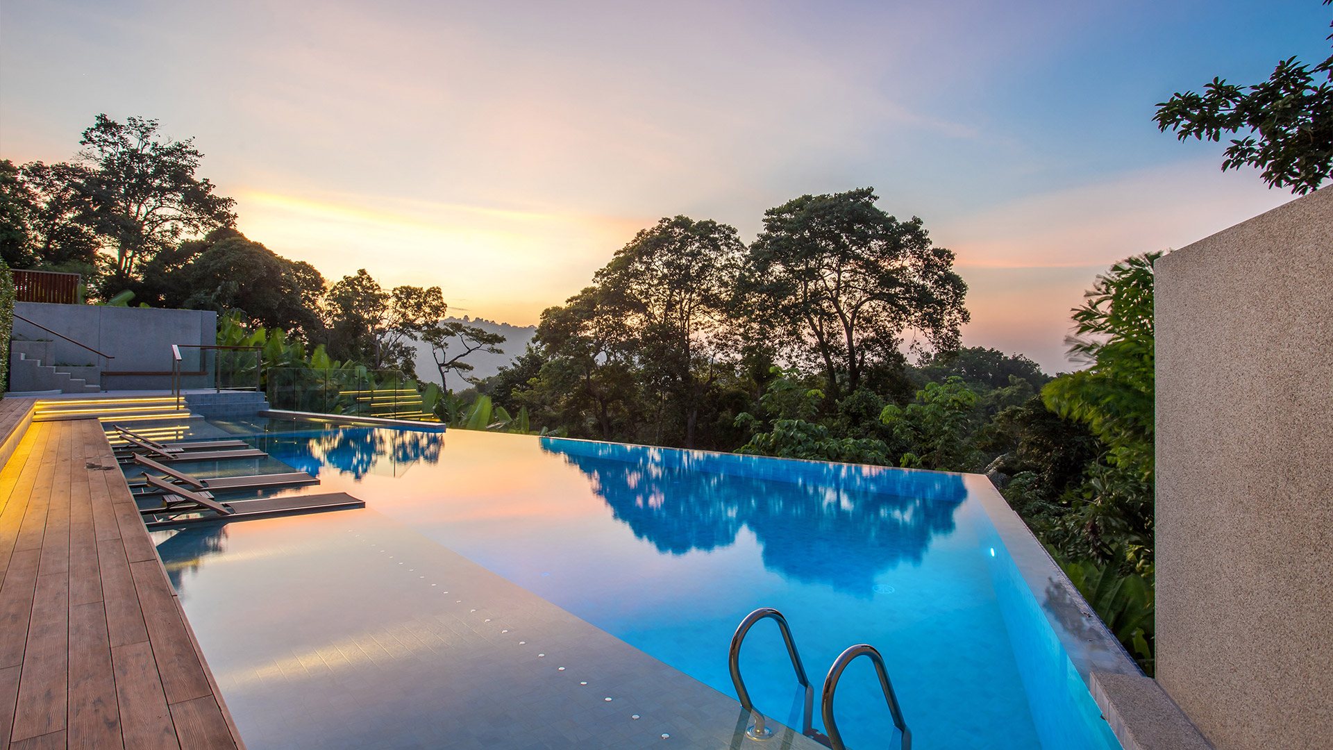 Bluepoint Condominiums, Patong, Phuket – Infinity pool at sunset