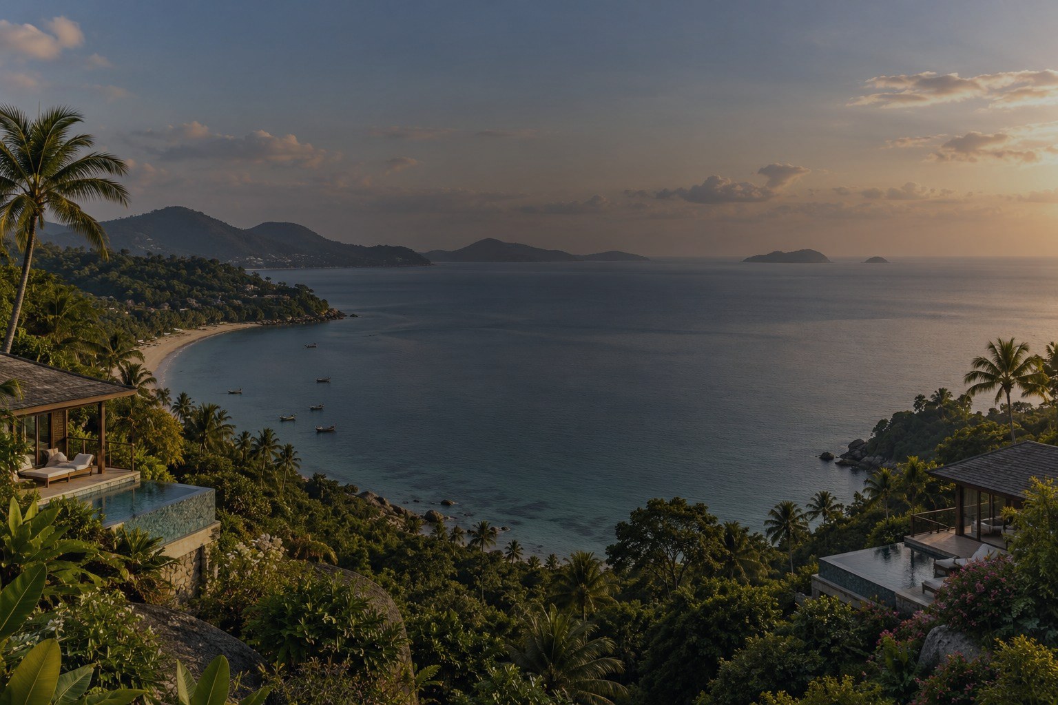 Villas on a hillside above a bay in Koh Samui